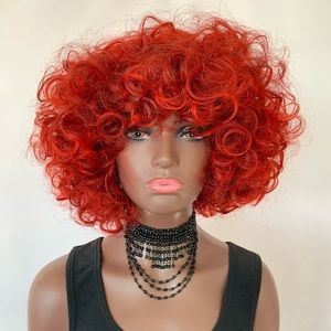 A Pretty Fire Red Color Curly Premium Fiber “Put On & Go” Wig